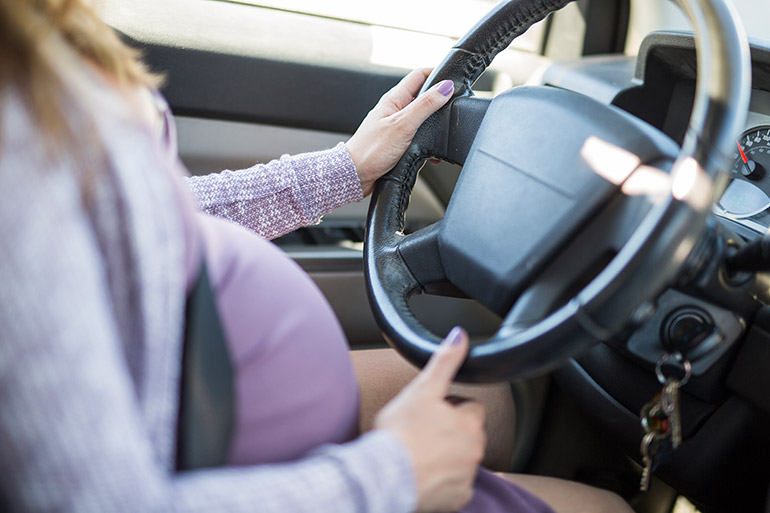 Occupants in a vehicle, especially pregnant women, are subjected to relatively large forces suddenly and over a short period when a vehicle accelerates over a speedbump